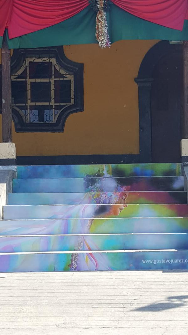 Painting by Gustavo Juárez on the staircases to the townhall of San Lucas Toliman, 2018